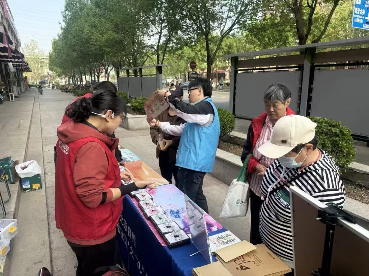 社区百场行|“集章打卡探京城”——“党报进社区”走进北花园社区